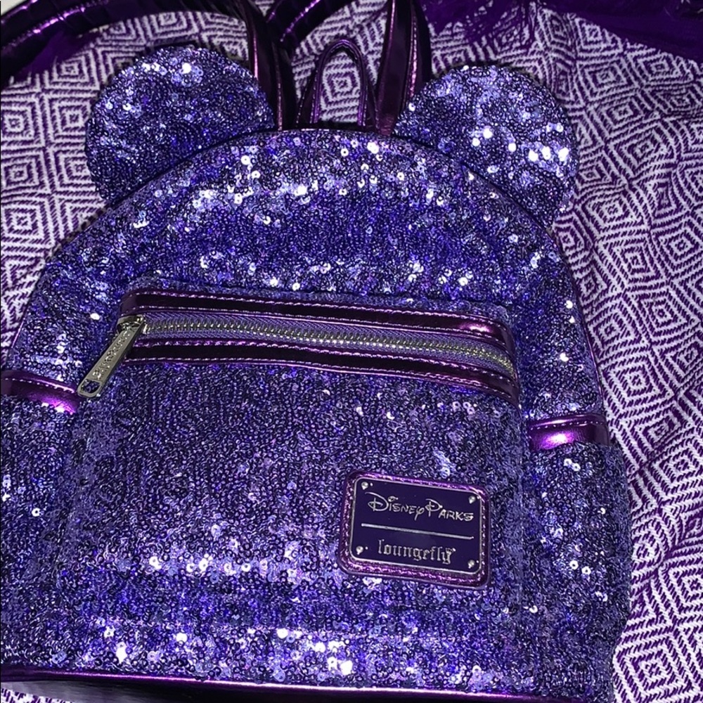 Disney limited edition purple backpack.